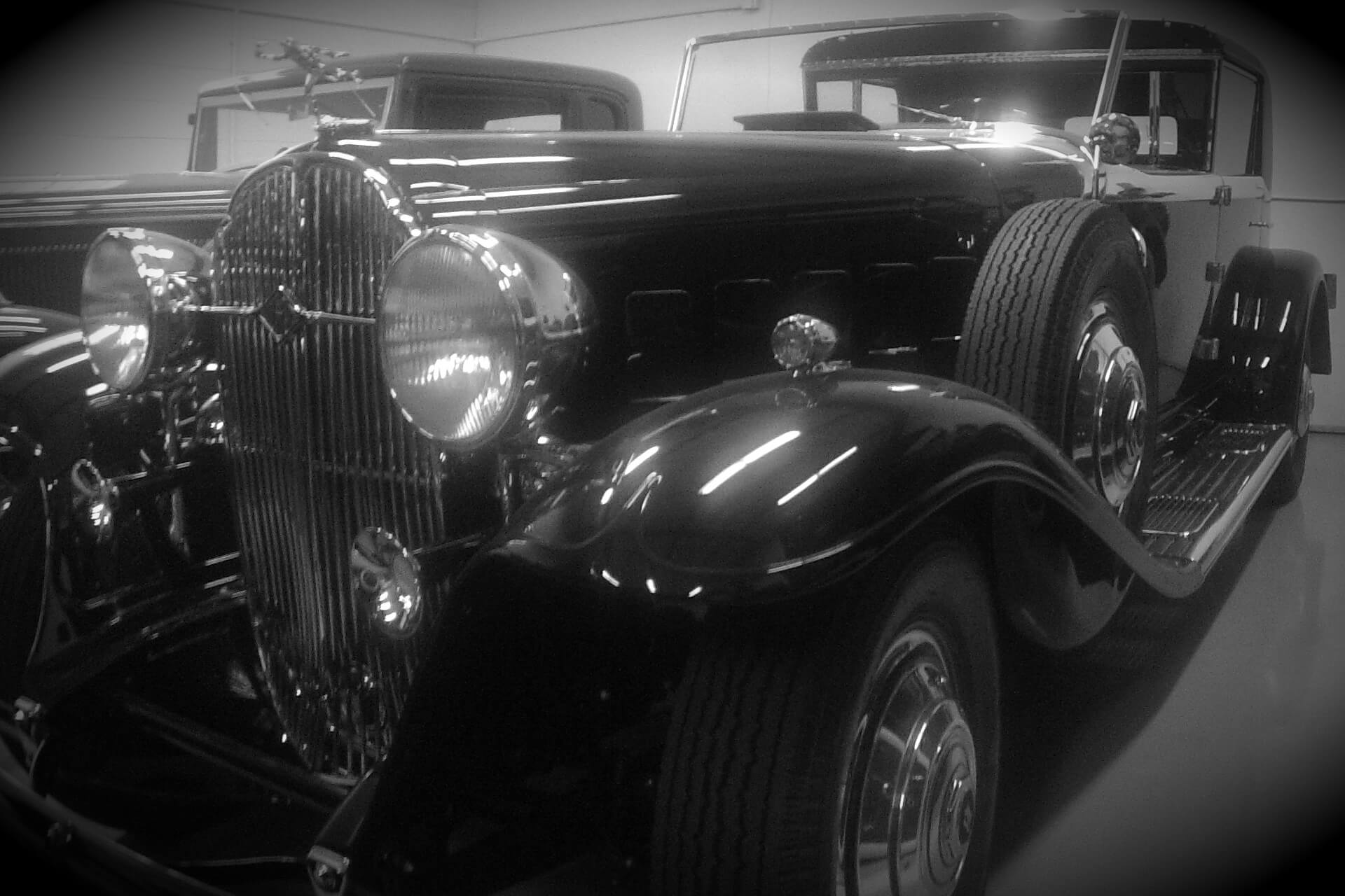 Black prewar automobile inside the Pumphrey and Co. shop